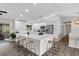 Spacious kitchen with an island and barstool seating, perfect for casual dining and entertaining at 824 35Th Avenue W Dr, Palmetto, FL 34221