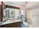 Bathroom with a single sink, toilet, and shower/tub combination at 8305 Palencia Dr, Port Richey, FL 34668