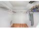 Bright, walk-in closet with shelving and hanging space at 8305 Palencia Dr, Port Richey, FL 34668
