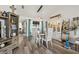 Stylish dining area featuring a large table and modern decor, perfect for Gathering meals at 9114 Dorsey St, Spring Hill, FL 34608