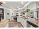 Contemporary kitchen featuring granite countertops, stainless steel appliances, and ample counter space at 9114 Dorsey St, Spring Hill, FL 34608