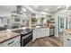 Well-equipped kitchen with modern appliances, granite countertops, and stylish fixtures at 9114 Dorsey St, Spring Hill, FL 34608