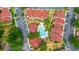 Aerial view of community with inviting pool and surrounding residences and parking at 9481 Highland Oak Dr # 710, Tampa, FL 33647
