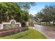 The Highlands Condominium Residences entrance sign with landscaping and a view of the community at 9481 Highland Oak Dr # 710, Tampa, FL 33647