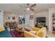 Spacious living area with an open concept, connecting the living room, dining area, and kitchen at 9481 Highland Oak Dr # 710, Tampa, FL 33647