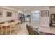 An open concept living space that features a dining area, kitchen, and living room at 9481 Highland Oak Dr # 710, Tampa, FL 33647
