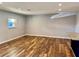 Living room featuring wood floors, recessed lighting, and a window with natural light at 9893 86Th N Way, Seminole, FL 33777