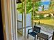 This screened-in patio is the perfect place to relax and enjoy the weather at 9893 86Th N Way, Seminole, FL 33777