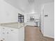 Bright kitchen featuring white cabinets, stainless steel appliances, and granite countertops at 9981 58Th N St, Pinellas Park, FL 33782
