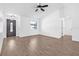 Bright and spacious living room features modern flooring at 9981 58Th N St, Pinellas Park, FL 33782