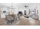 Open-concept living space with modern flooring, dining area, and comfortable seating at 9981 58Th N St, Pinellas Park, FL 33782