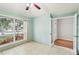 Sunlit office with a large window, tile flooring, and glass French doors at 10150 Heather Sound Dr, Tampa, FL 33647