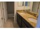 Bathroom featuring double vanity with granite countertop and tile flooring at 1022 Oliveto Verdi Ct, Brandon, FL 33511