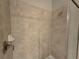 Shower featuring tile walls and modern fixtures at 1022 Oliveto Verdi Ct, Brandon, FL 33511