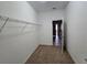 Walk-in closet with carpet and shelving at 1022 Oliveto Verdi Ct, Brandon, FL 33511