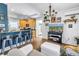 Modern living space featuring a breakfast bar and an entertainment center with a flat screen TV at 1038 Crescent Lake N Dr, St Petersburg, FL 33701
