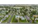 Community aerial view showcasing a pool, recreational area, manicured lawns, and well-maintained surroundings at 10430 42Nd N St, Clearwater, FL 33762