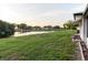 Expansive backyard with scenic water views and lush greenery at 10430 42Nd N St, Clearwater, FL 33762