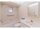Full bathroom with a shower/tub combination, vanity with sink, and a butterfly-themed border at 10430 42Nd N St, Clearwater, FL 33762