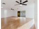 A bright, spacious living room with tile flooring and modern ceiling fans is great for entertaining at 10430 42Nd N St, Clearwater, FL 33762