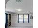 Bright bedroom featuring large windows with plenty of natural light and closet at 106 E Cedar St, Tarpon Springs, FL 34689