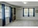 Bright bedroom featuring large windows with plenty of natural light and closet at 106 E Cedar St, Tarpon Springs, FL 34689
