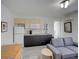 Living room and kitchen features modern decor with updated seating at 106 E Cedar St, Tarpon Springs, FL 34689