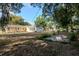 Large backyard featuring mature trees and home exterior at 108 E Morgan St, Brandon, FL 33510