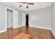 Bedroom features wood floors and multiple closets at 108 E Morgan St, Brandon, FL 33510