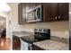 Kitchen features granite countertops, stainless steel appliances, and plenty of cabinet space at 10837 Breaking Rocks Dr, Tampa, FL 33647
