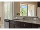 Kitchen featuring stainless steel dishwasher, granite countertops, and ample counter space at 10837 Breaking Rocks Dr, Tampa, FL 33647