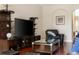 Comfortable seating area with hardwood floors and ample lighting at 10837 Breaking Rocks Dr, Tampa, FL 33647