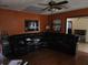 Cozy living room with a large sectional sofa and a view into the kitchen at 1100 Union S St, St Petersburg, FL 33712