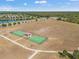 Community aerial view featuring multiple basketball courts, soccer field and walking trails at 11917 Greenchop Pl, Riverview, FL 33579