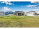 Back exterior of home with generous lawn and privacy fence at 11917 Greenchop Pl, Riverview, FL 33579