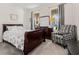 Bedroom with neutral tones, lots of natural light, with coordinating furnishings at 11917 Greenchop Pl, Riverview, FL 33579