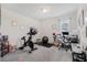 Multi-purpose space with an exercise bike, office chair, and lots of natural light at 11917 Greenchop Pl, Riverview, FL 33579