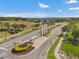 Community entrance sign with landscaped median and pristine landscaping at 11917 Greenchop Pl, Riverview, FL 33579