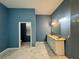 Bathroom with double sinks, vanity and tile flooring at 12349 Wasatch Ct, New Port Richey, FL 34654