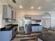 Spacious kitchen with stainless steel appliances and plenty of counter space, ideal for culinary enthusiasts at 12349 Wasatch Ct, New Port Richey, FL 34654