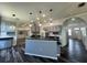 Kitchen boasts granite countertops, stainless steel appliances, and custom cabinetry for a sleek, modern aesthetic at 12349 Wasatch Ct, New Port Richey, FL 34654