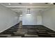 Spacious living room featuring hardwood floors and a modern chandelier at 12349 Wasatch Ct, New Port Richey, FL 34654