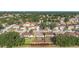 Aerial shot of a neighborhood, with tidy backyards, nice patios, and mature landscaping at 12426 Dawn Vista Dr, Riverview, FL 33578