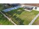 Aerial view of backyard, patio, and privacy fence at 12426 Dawn Vista Dr, Riverview, FL 33578