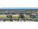 Community aerial showcasing well-maintained homes, mature trees, and convenient highway access at 12426 Dawn Vista Dr, Riverview, FL 33578