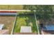 Aerial view of fenced backyard, featuring a well-maintained lawn, and patio with seating at 12426 Dawn Vista Dr, Riverview, FL 33578