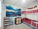 Bedroom with bunk beds and mountain mural wall art at 12426 Dawn Vista Dr, Riverview, FL 33578