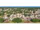 A neighborhood aerial view, showing green landscaping, with well-maintained backyards and patios at 12426 Dawn Vista Dr, Riverview, FL 33578