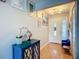 Inviting entryway with modern light fixture and a view of the home's interior at 12426 Dawn Vista Dr, Riverview, FL 33578