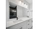 Sleek bathroom featuring double sinks, modern fixtures, and elegant countertops at 1316 W Carmen St # 2, Tampa, FL 33606